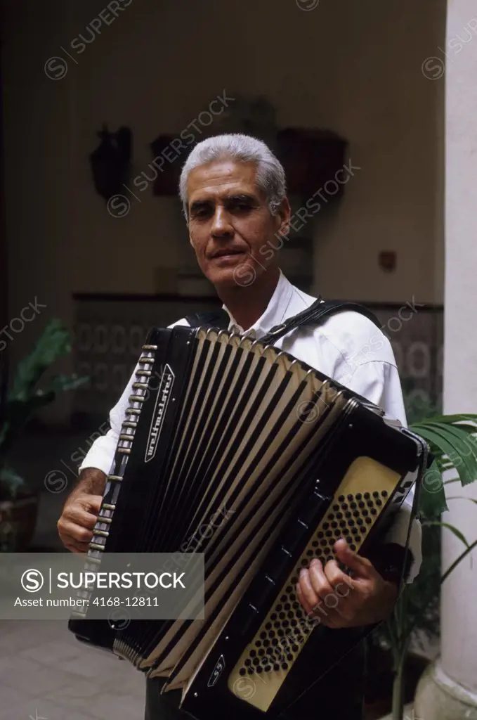 Cuba, Old Havana, Street Scene, Man With Accordion