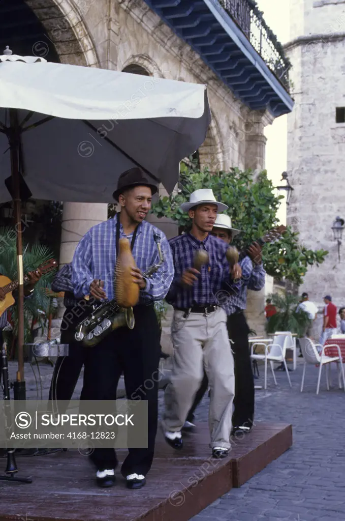 Cuba, Old Havana, Plaza De La Catedral, Cuban Band Playing At Sidewalk Cafe