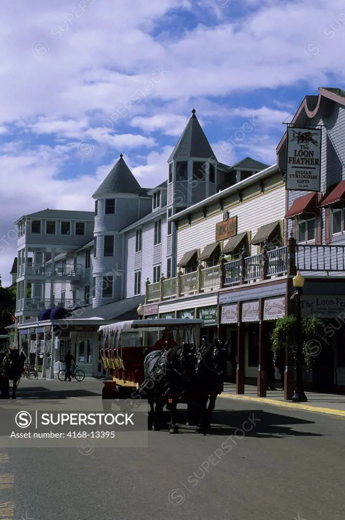 USA, Michigan, Lake Huron Mackinac Island, Village, Main Street, Street Scene, Horse Cart Taxi