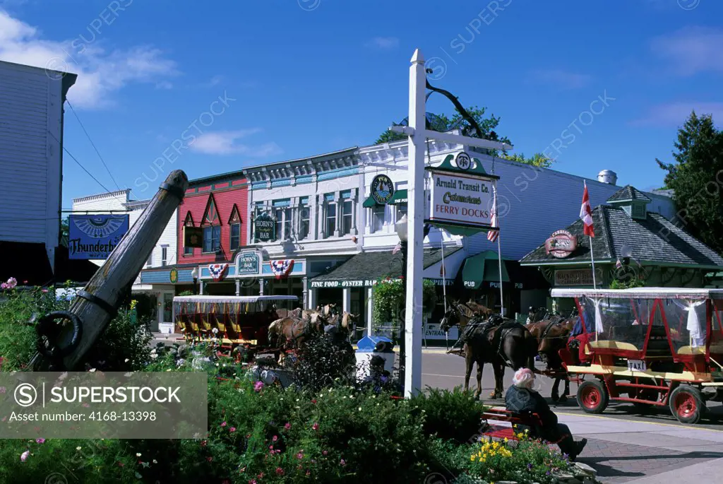 USA, Michigan, Lake Huron Mackinac Island, Village, Main Street, Street Scene, Ferry Dock