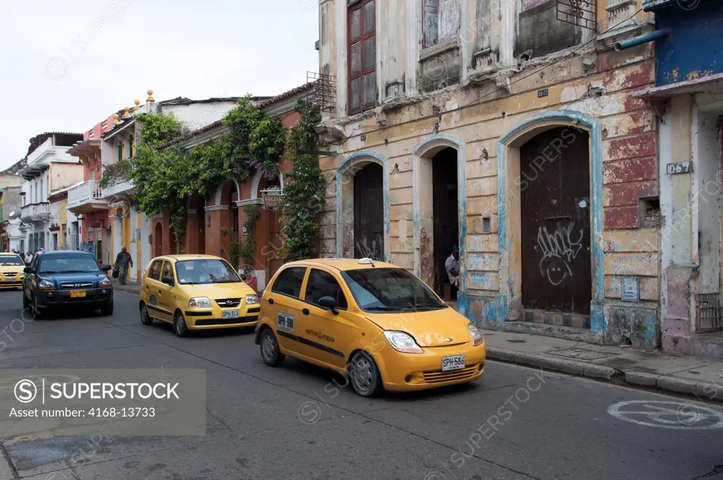 Street Scene With Cars In The Getsemani Area Of Cartagena, Colombia