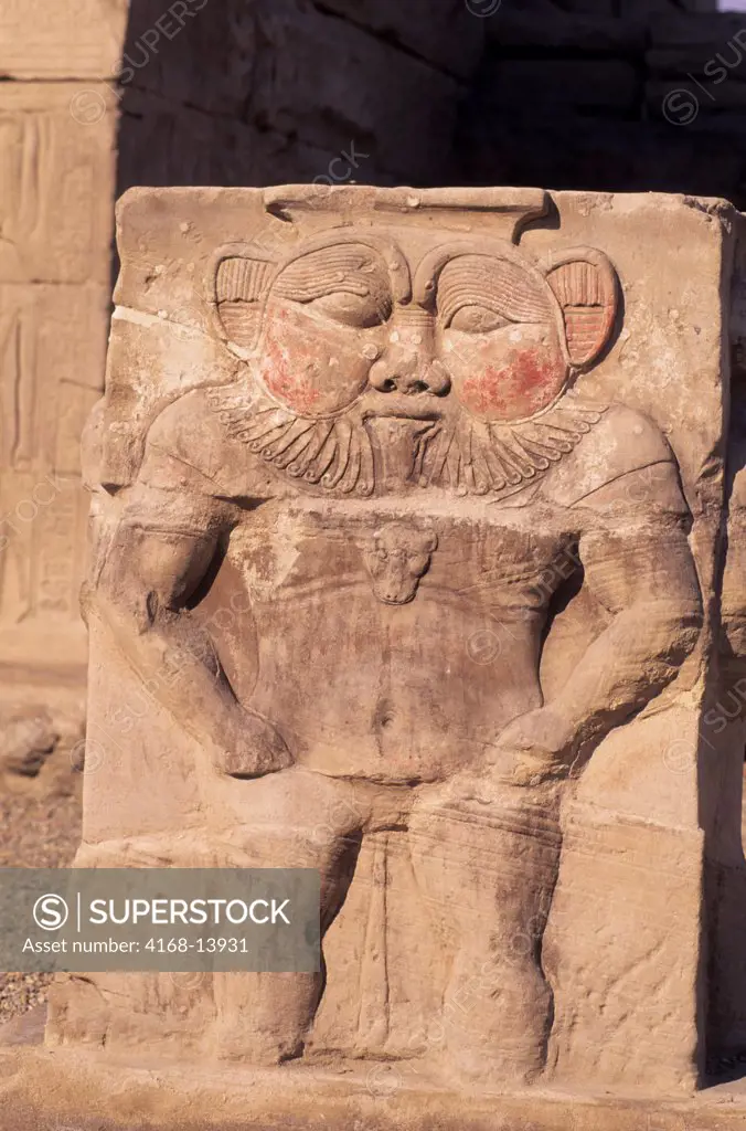 Egypt, Nile River, Near Dendera, Temple Of Hathor, Carving Of Bes (Patron Deity Of Music, Dancing, And Children)