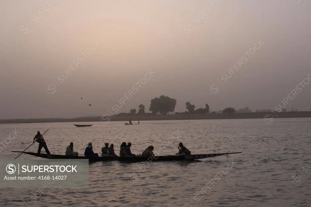 Mali, Mopti, Bani River, Harmattan Dust Storm, People In Pirogue (Canoe)