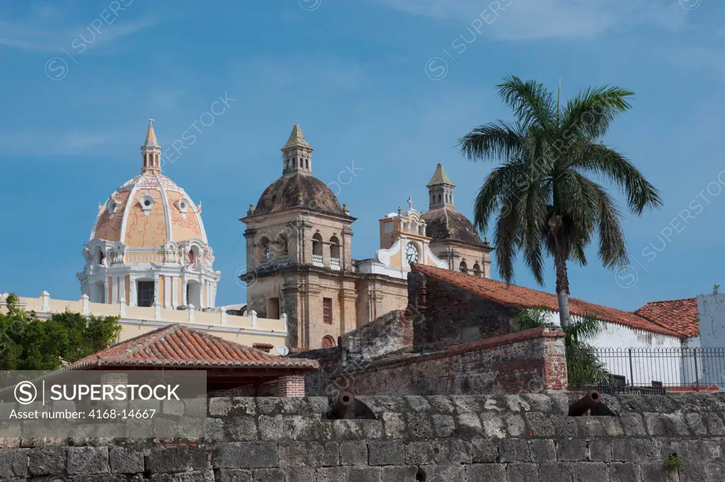 City Wall Of The Old Walled City Of Cartagena, Colombia With San Pedro Claver Church In Background