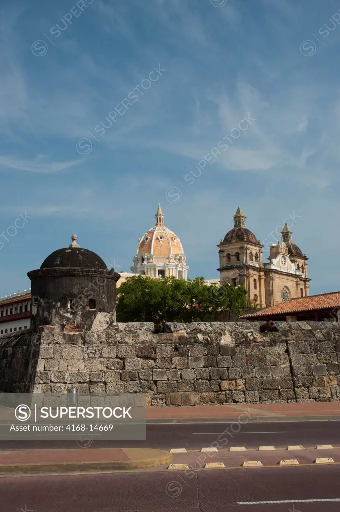 City Wall Of The Old Walled City Of Cartagena, Colombia With San Pedro Claver Church In Background, Unesco World Heritage Site