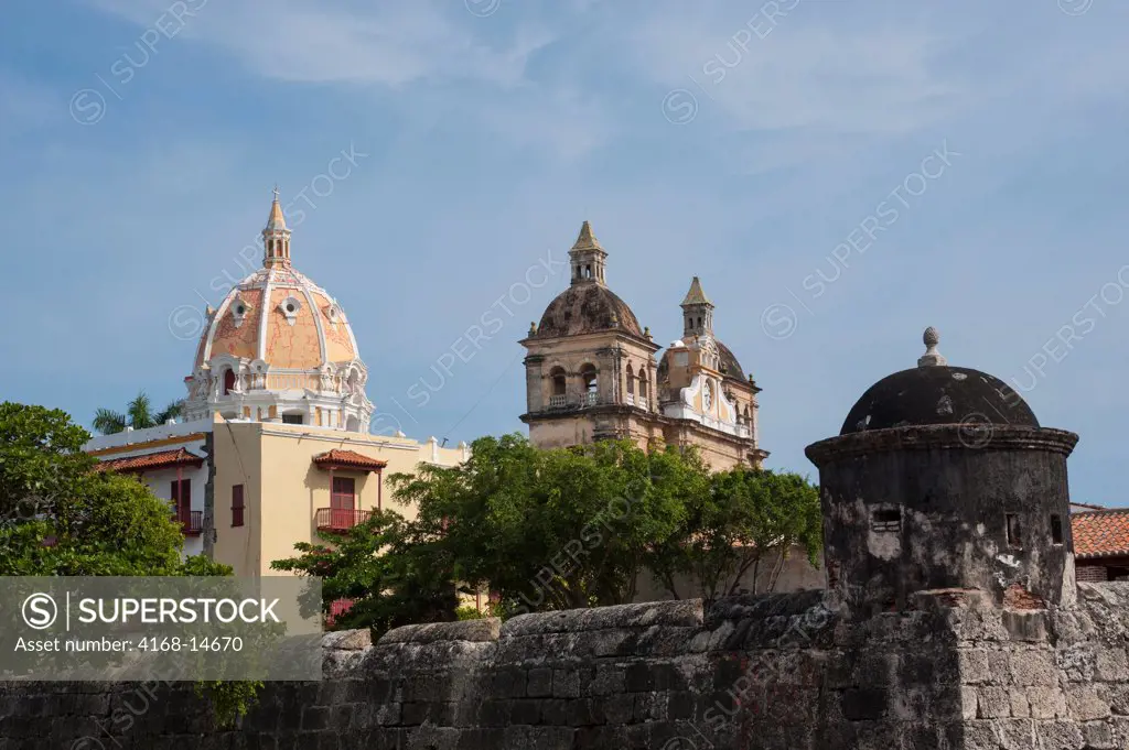 City Wall Of The Old Walled City Of Cartagena, Colombia With San Pedro Claver Church In Background, Unesco World Heritage Site