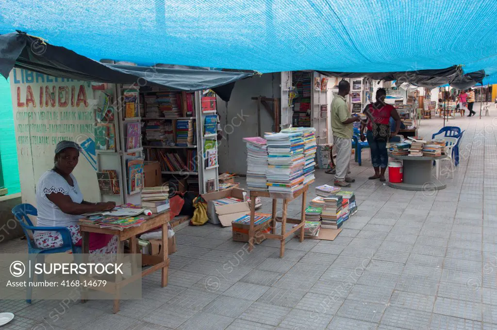 Street Scene In Cartagena, Colombia With People Selling Used Books