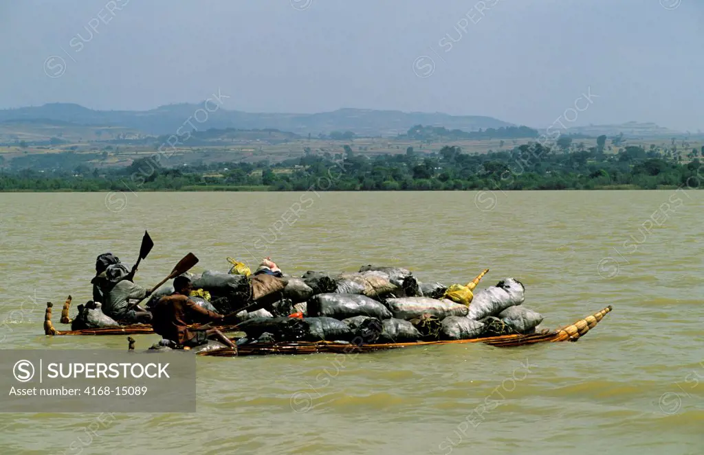 Ethiopia, Bahar Dar, Lake Tana, People Transporting Charcoal On Papyrus Boats