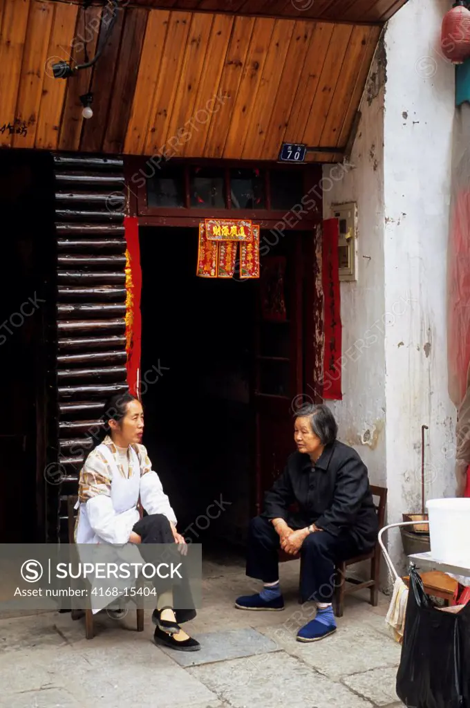 China, Guangxi Province, Near Guilin, Yangshuo, Street Scene With Local Women