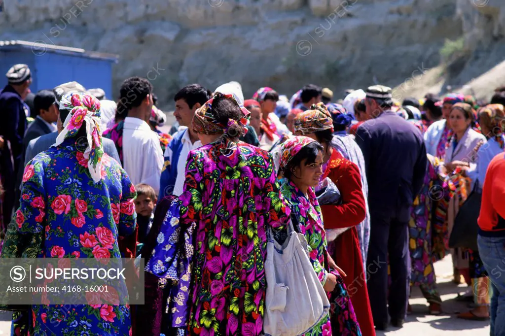 Uzbekistan, Bukhara, Market Scene, Gypsy Women Selling Fabrics