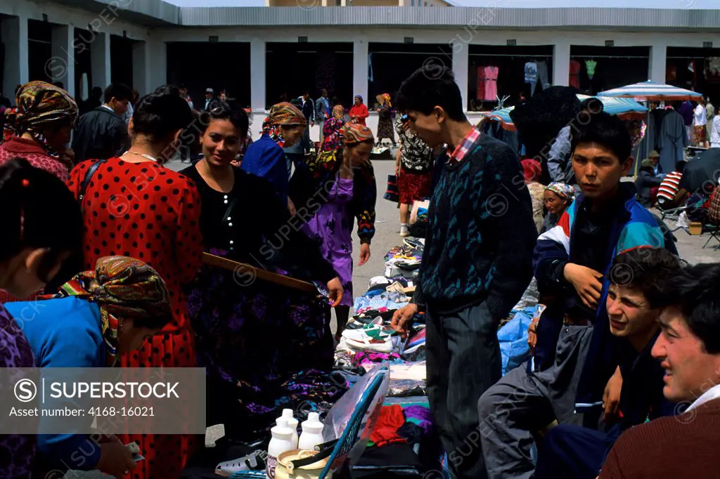 People On A Market In Urganch, Uzbekistan Along The Silk Road