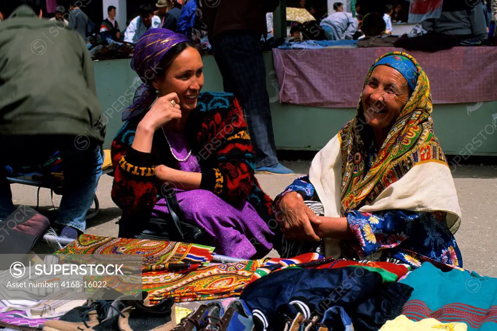Women Selling Fabrics At A Market In Urganch, Uzbekistan Along The Silk Road