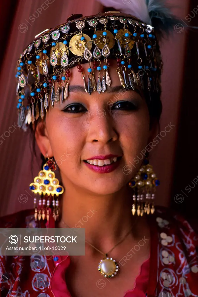 Uzbekistan, Urganch, Portrait Of Woman With Traditional Dress