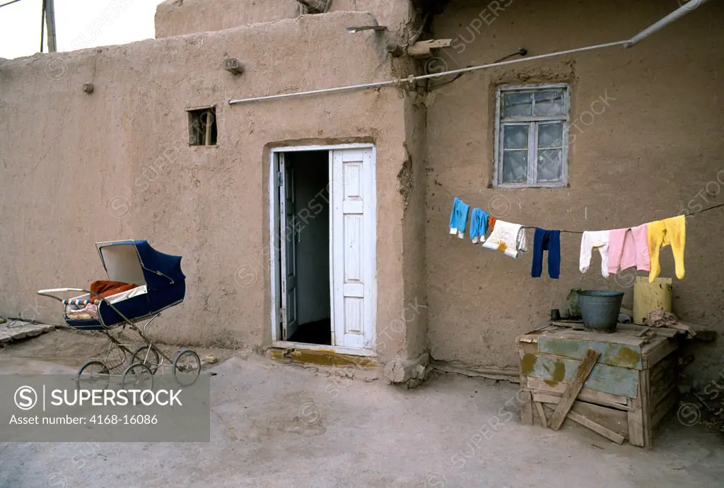Uzbekistan, Khiva, Old Town, House With Laundry & Stroller