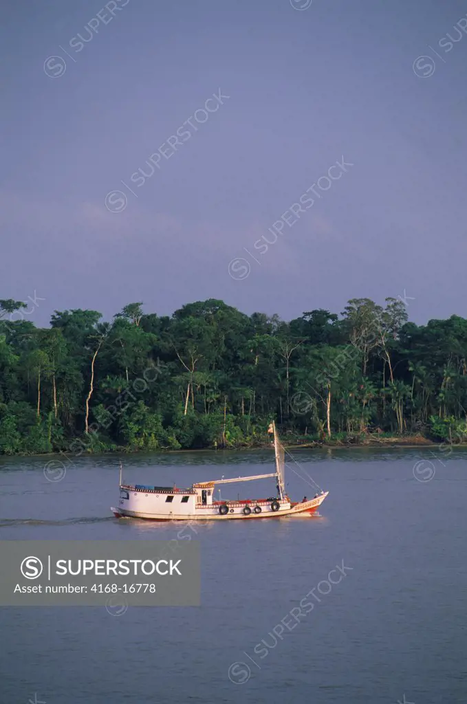 A Small Boat Navigates Through The Narrows Of The Amazon River Delta Near Belem, Brazil