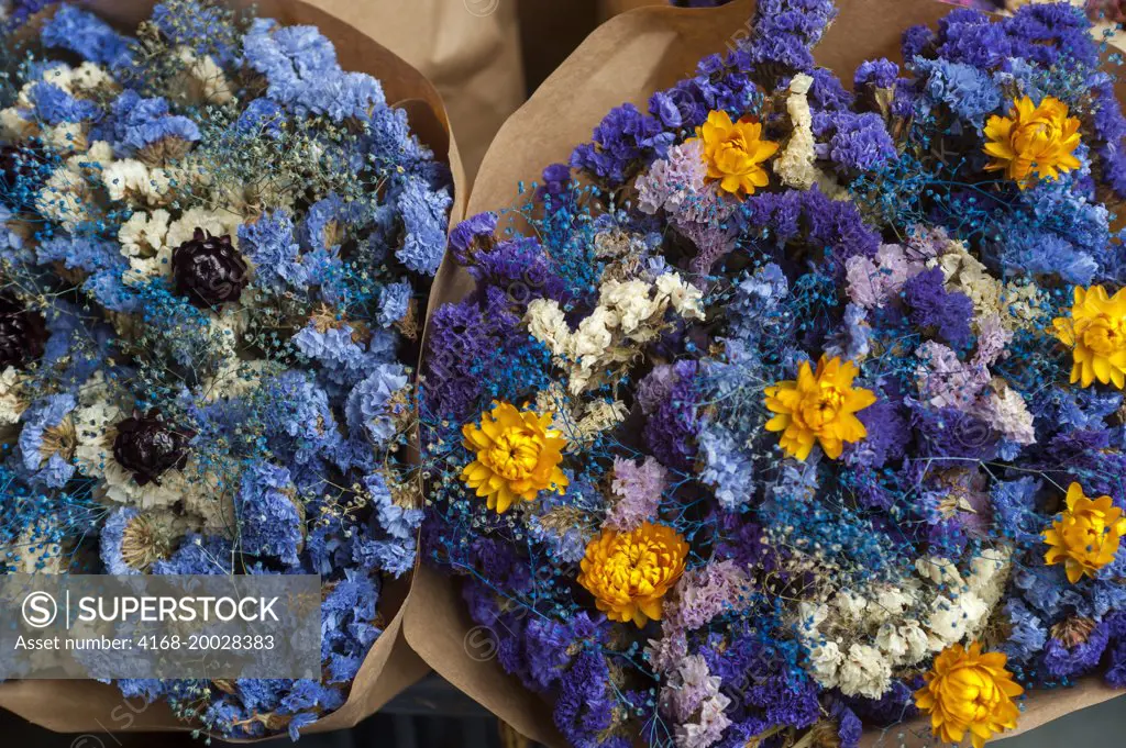 Colorful dried flower bouquets for sale at the Pike Place Market in Seattle, Washington State, USA.