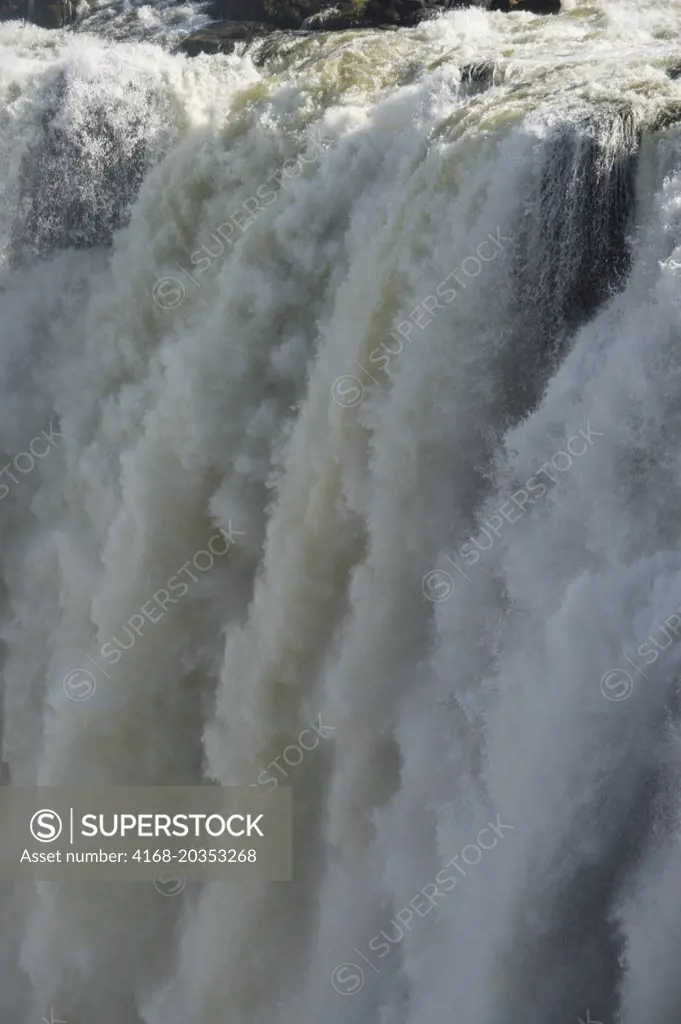 Close view from Zambia of Victoria Falls and the Zambezi River.