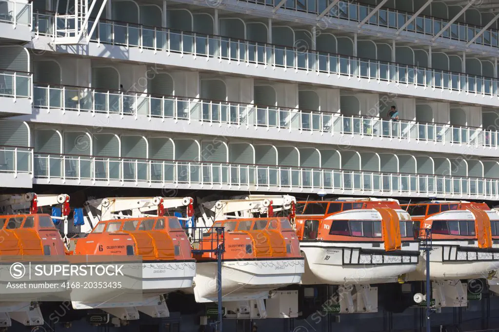Detail of lifeboats of the Celebrity Infinity, a cruise ship with a 1950 passenger capacity, docked in the port of Montevideo, Uruguay.