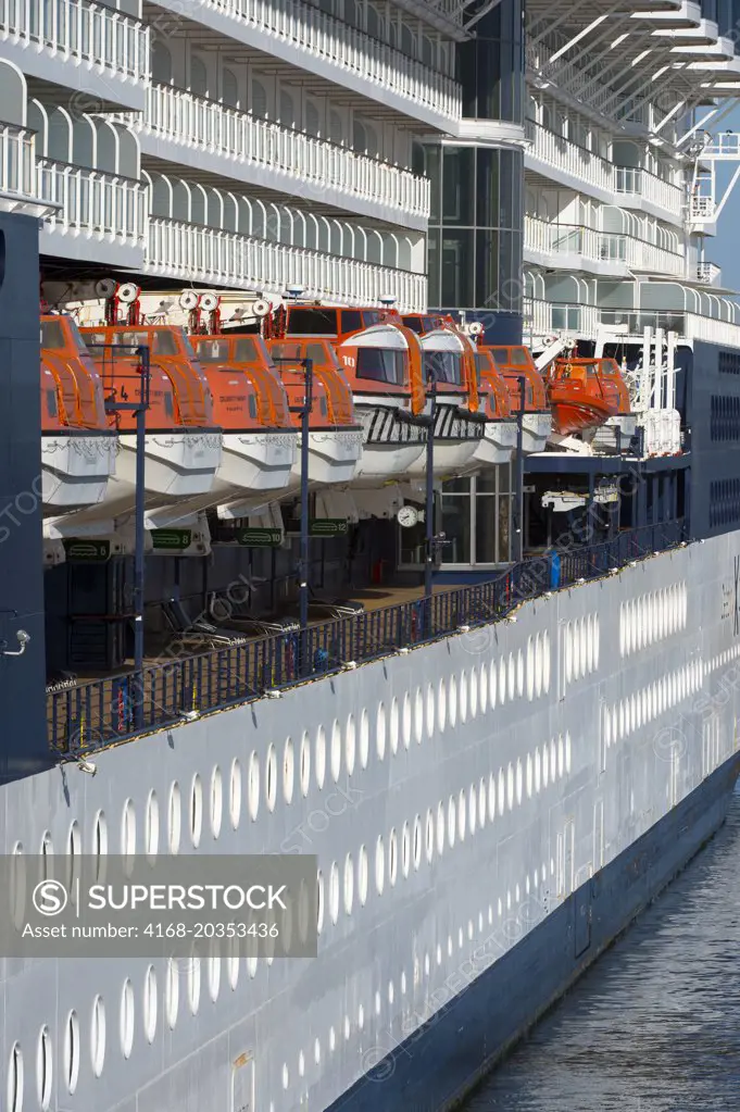 Detail of lifeboats of the Celebrity Infinity, a cruise ship with a 1950 passenger capacity, docked in the port of Montevideo, Uruguay.