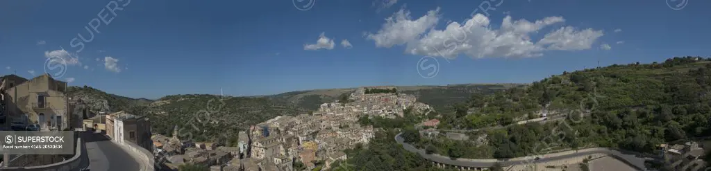 Panorama photo (41 by 10 inches) of Ragusa Ibla, the older part of town, from the upper town of Ragusa, on the island of Sicily in Italy.