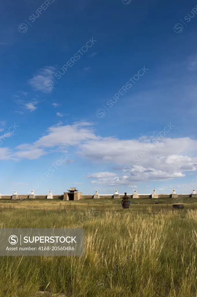 The courtyard of the Erdene Zuu monastery in Kharakhorum (Karakorum) in Mongolia with the wall with stupas in the background.