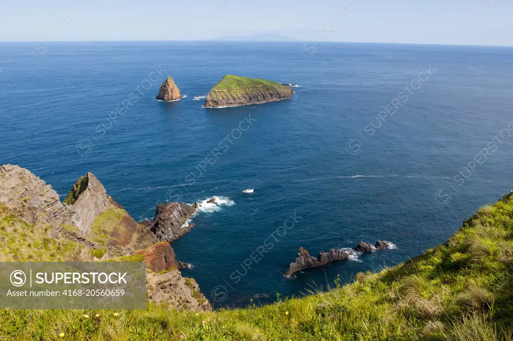 View of bird islands from Ponta da Restinga along the coast of Graciosa Island in the Azores, Portugal.