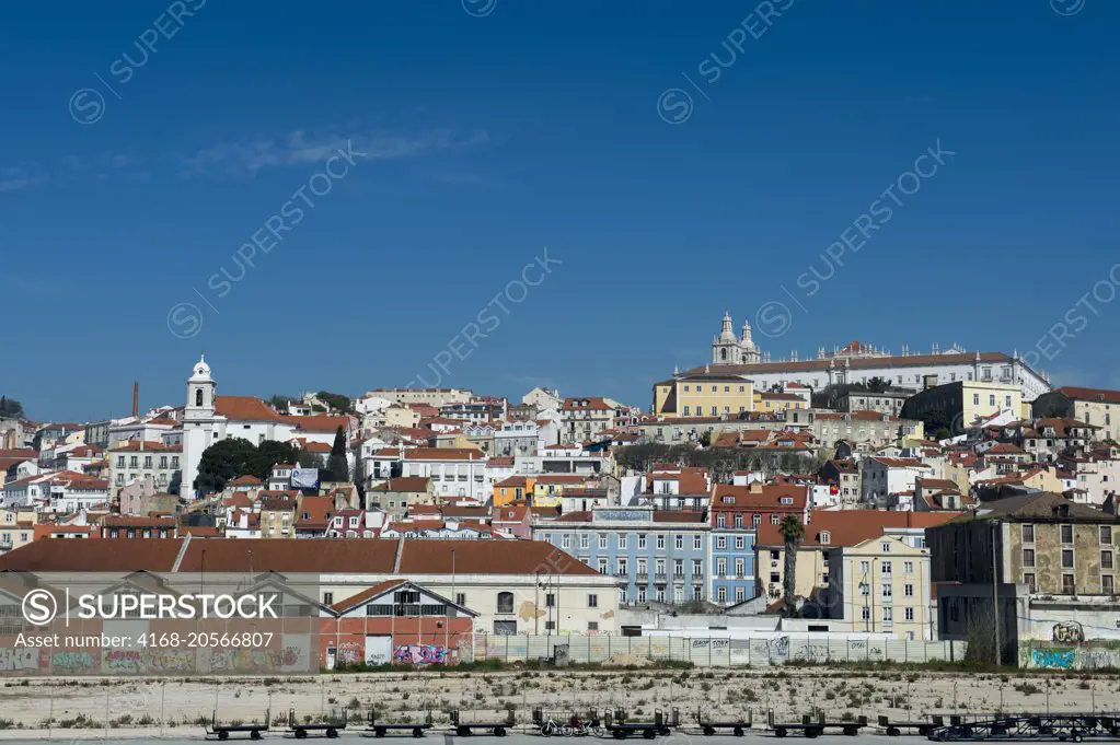 View from the Tagus River of Lisbon, the capital city of Portugal with the old city Alfama and the Monastery of Sao Vicente de Fora.
