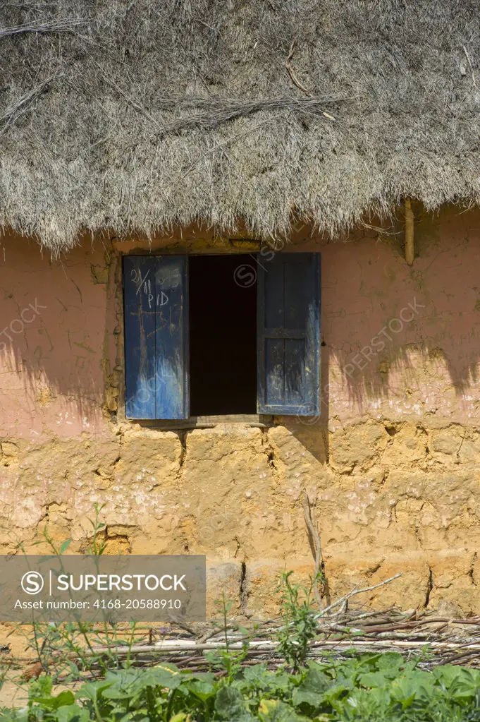 Traditional farm house along highway No. 2 east of Antananarivo, near Moramanga, Madagascar.