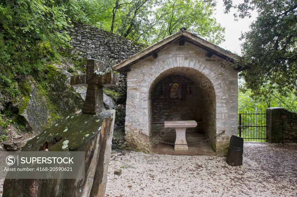 Small chapel in the forest at the Hermitage of St. Francis (Eremo delle Carceri) in a forest gorge at the Monte Subasio, above Assisi, Umbria, Italy.