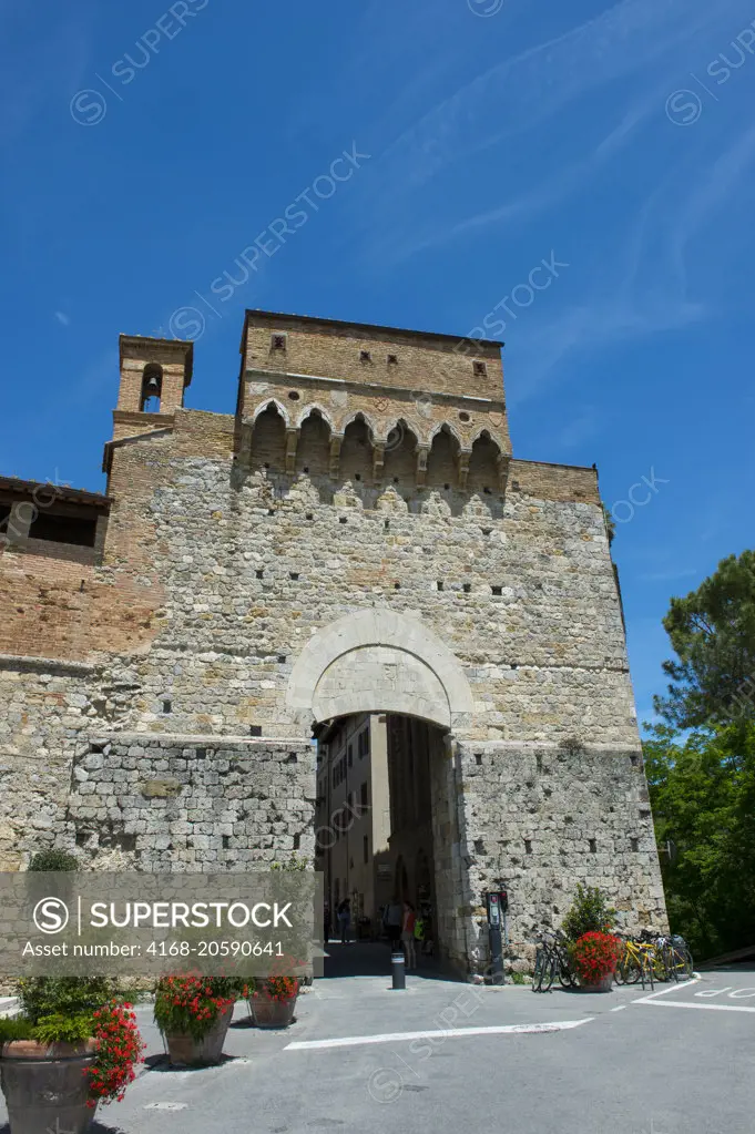 One of the gates of the medieval walled hill town of San Gimignano in Tuscany, Italy.