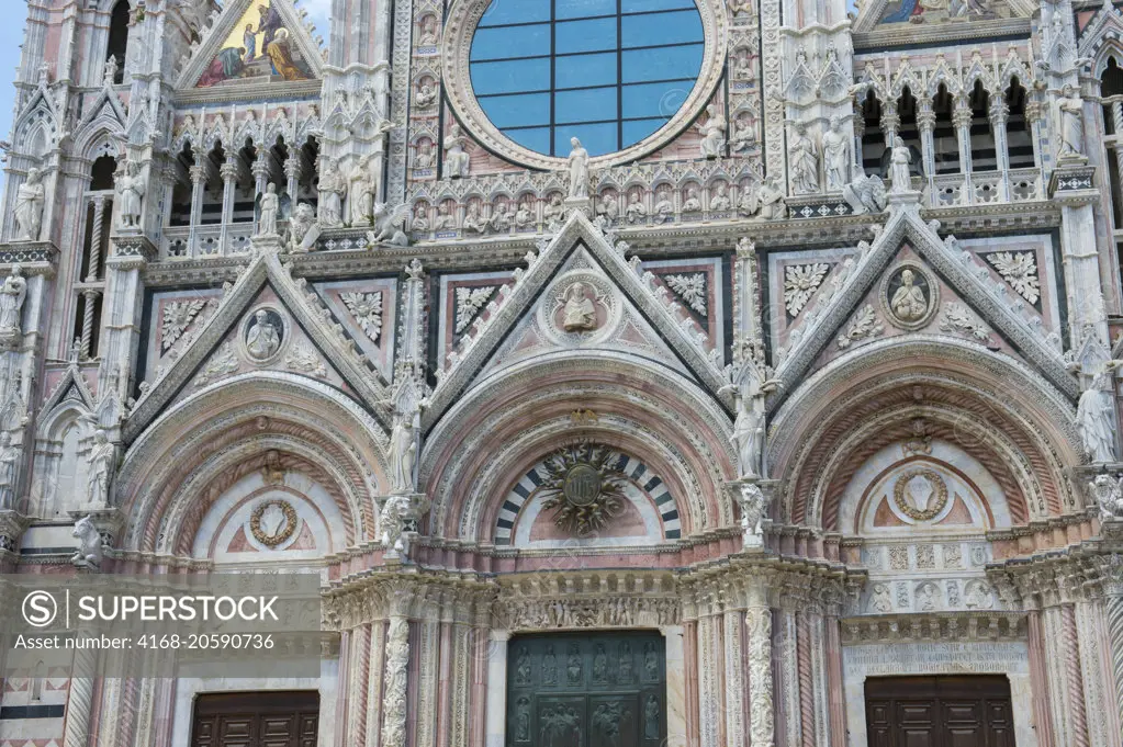 Detail of the Siena Cathedral di Santa Maria, better known as the Duomo, is a medieval marble church Siena, Italy of Gothic art from the 13th and 14th centuries.