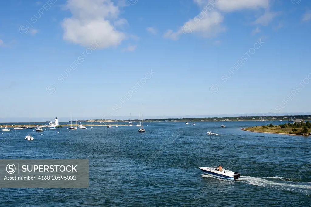 View of the bay with boats in Edgartown on Marthaís Vineyard, Massachusetts, USA, with the Edgartown lighthouse in background.