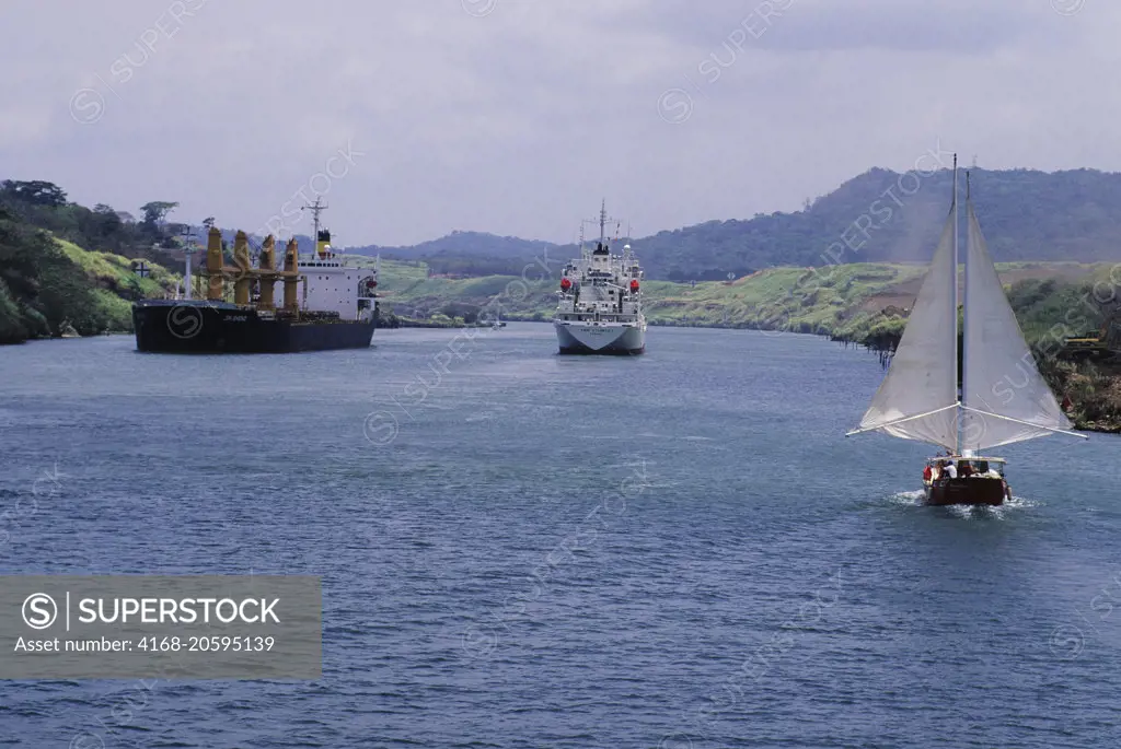 Ships passing through the Gaillard Cut of the Panama Canal in Panama.