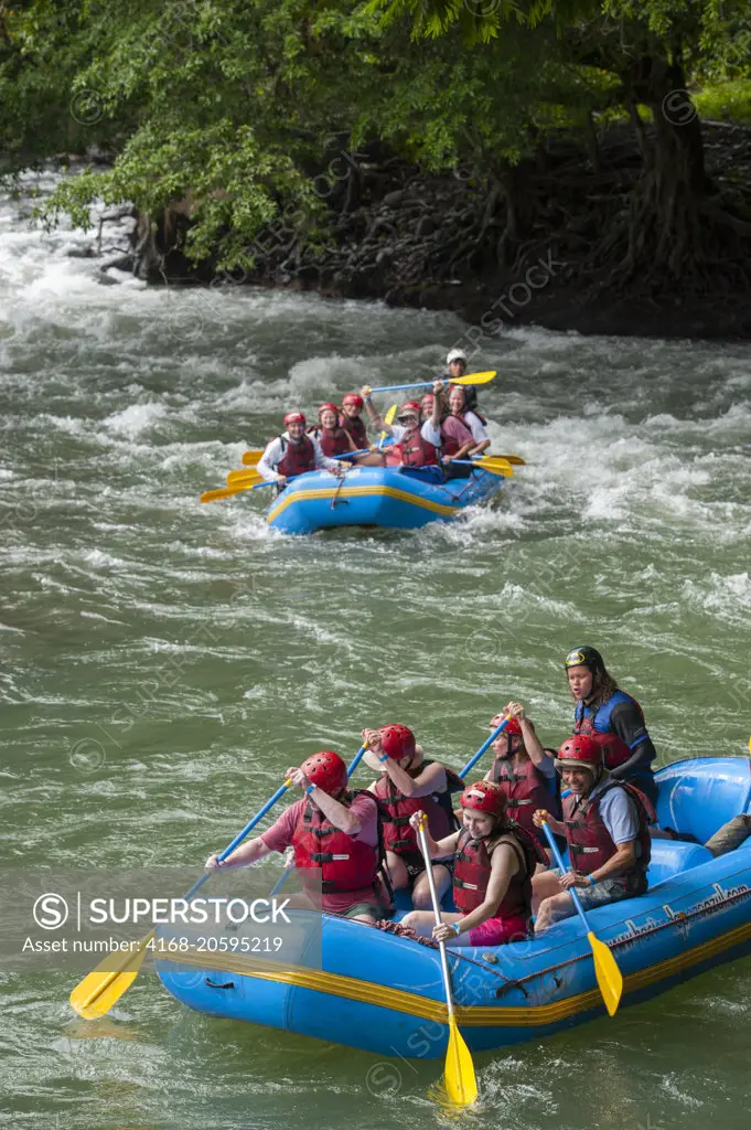 Tourists white water rafting at Pozo Azul near Virgen de Sarapiqui in Costa Rica.