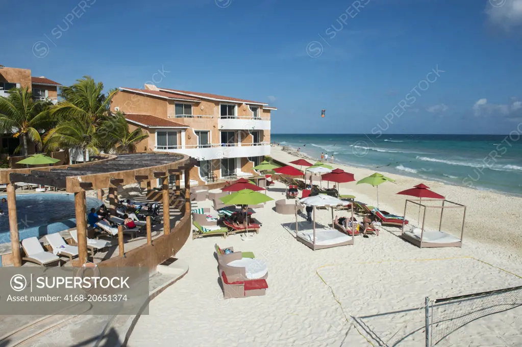 View of the beach at the Sunset Fishermen Spa & Resort in Playa del Carmen on the east coast of the Yucatán Peninsula on the Caribbean Sea in the state of Quintana Roo, Mexico.