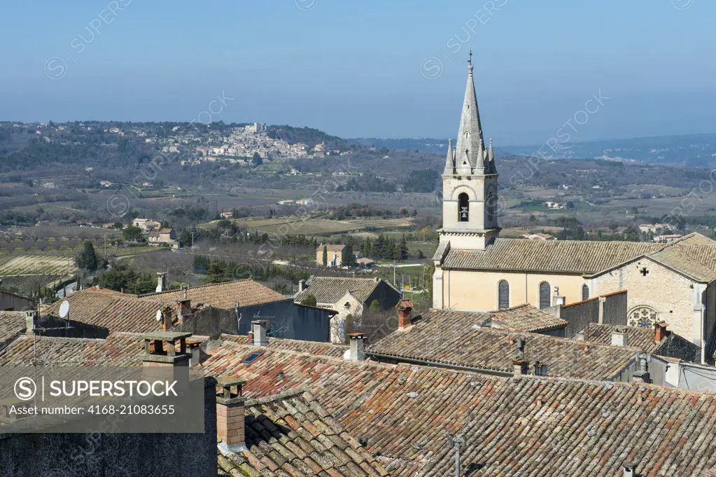 View from the hillside village of Bonnieux in the Luberon in the Provence-Alpes-Côte d'Azur region in southeastern France, with the village of Lacoste in background.