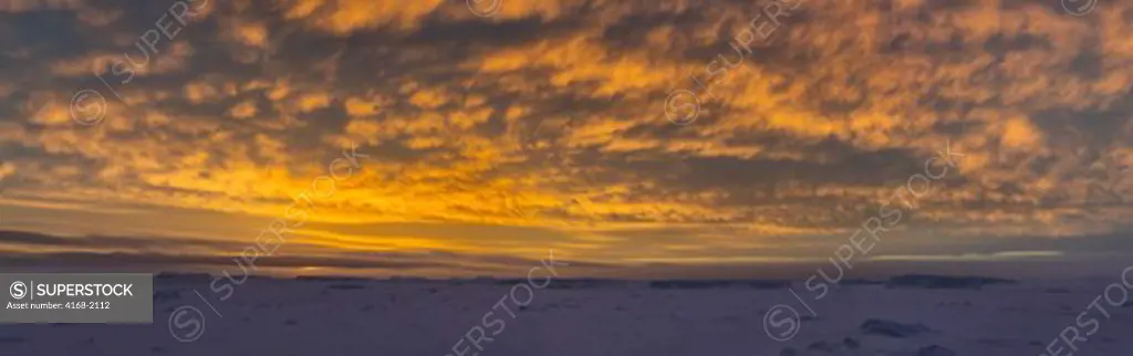 Antarctica, Weddell Sea, Near Snow Hill Island, Panoramic View Of Sea Ice And Icebergs At Sunset, Clouds