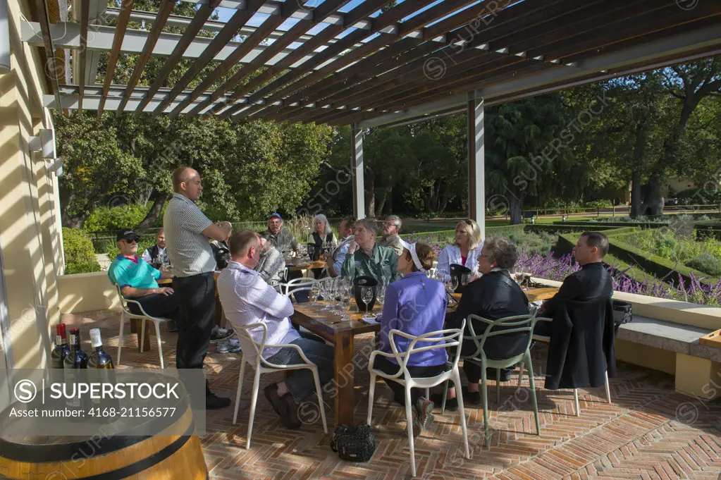 People at a wine tasting at Vergelegen, a historic wine estate in Somerset West, in the Western Cape province of South Africa near Cape Town.