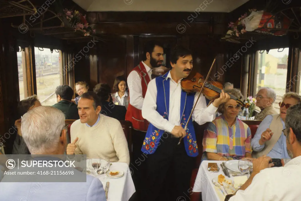 Hungarian gypsy musician performing traditional gypsy music on the Orient Express Train near Budapest, Hungary.