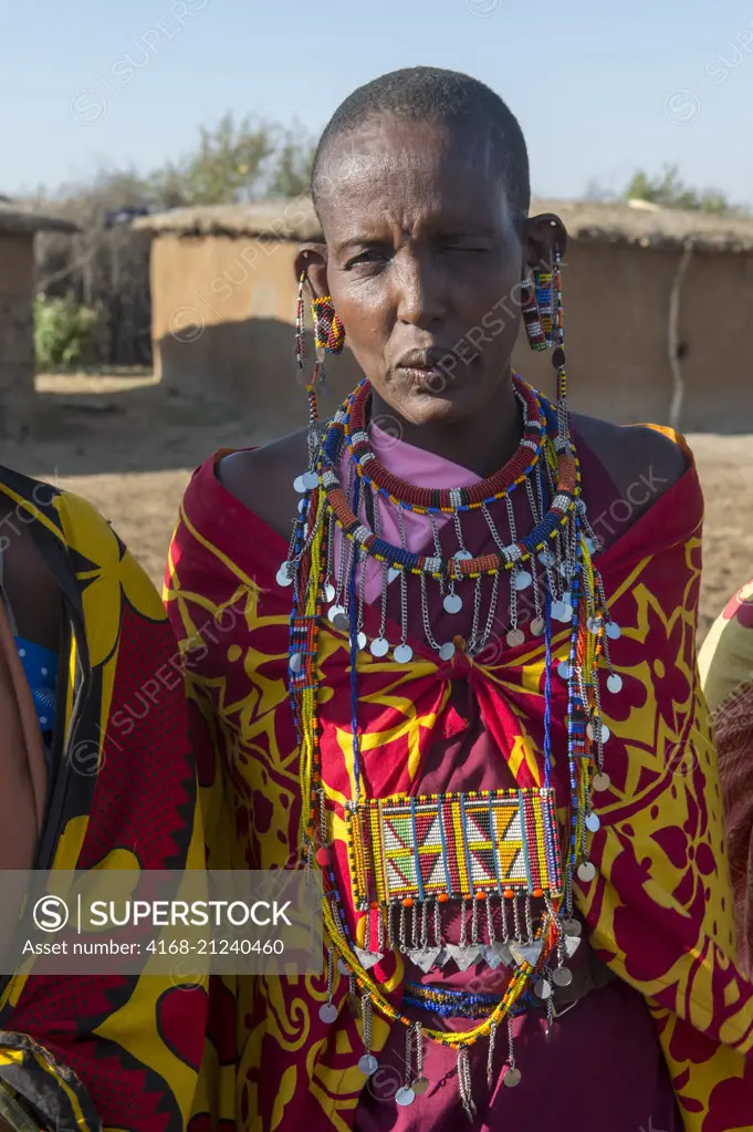 Close-up of a Maasai woman with her glass bead jewelry in a Maasai village in the Masai Mara in Kenya.