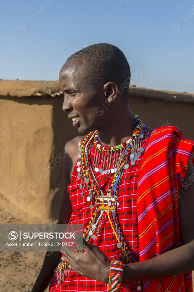 A young Maasai warrior in a Maasai village in the Masai Mara in Kenya.