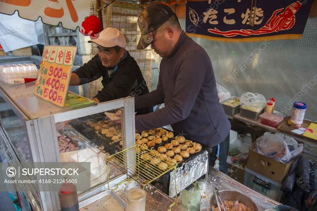 A food stand serving a dish with squid at the Yasaka Shrine, which is a Shinto shrine in the Gion District of Kyoto, Japan.