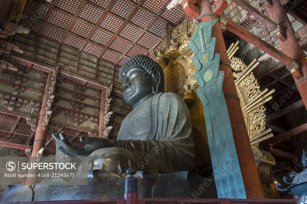 The Great Buddha (Daibutsu) in the Great Buddha Hall of the Todai-ji (Eastern Great Temple), which is a Buddhist temple complex located in the city of Nara, Japan.