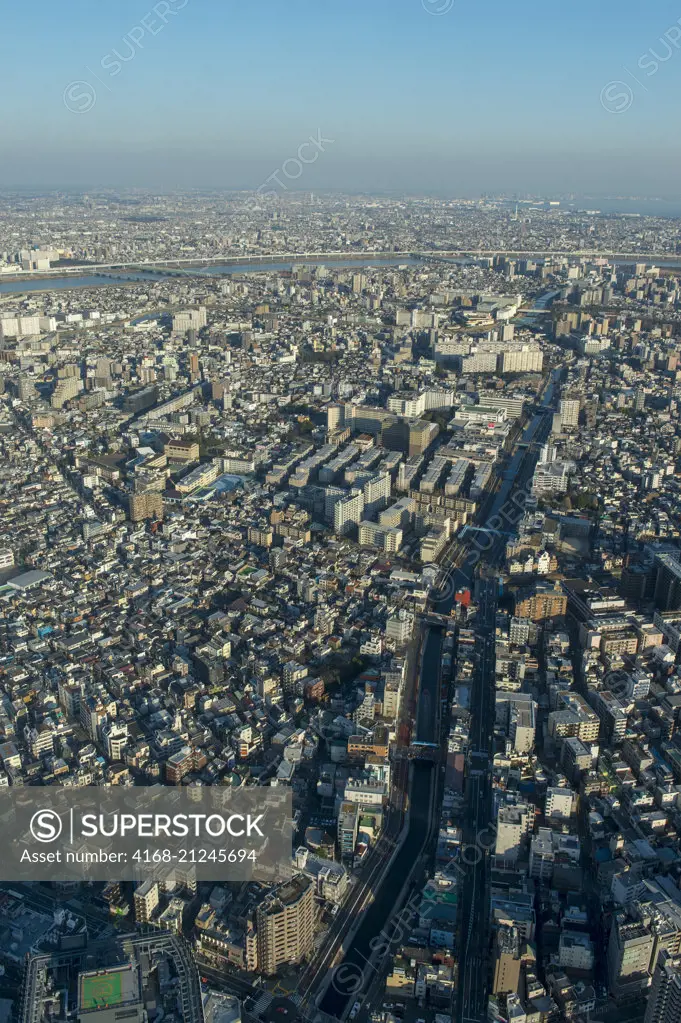 View from the Tokyo Skytree tower, which is the tallest tower in the world and is a broadcasting, restaurant, and observation tower in Sumida, Tokyo, Japan.