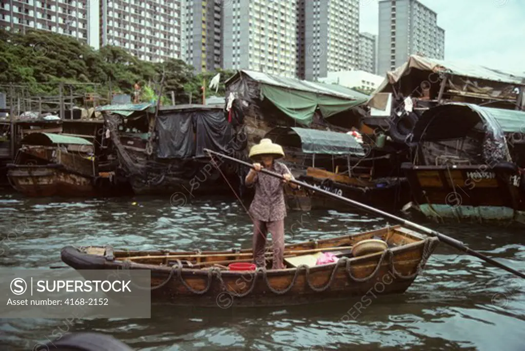 Hong Kong, Aberdeen, Harbor Scene With Woman In Boat