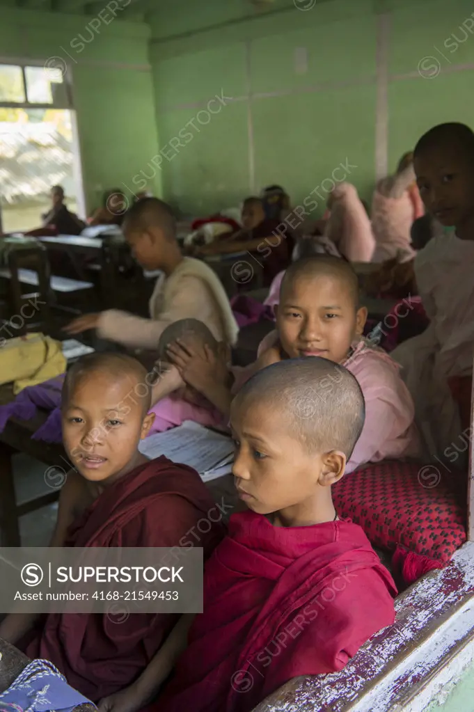 Elementary students in a classroom at the public school of the Aungmyazoo Monastary in Sagaing, a town outside of Mandalay, Myanmar.