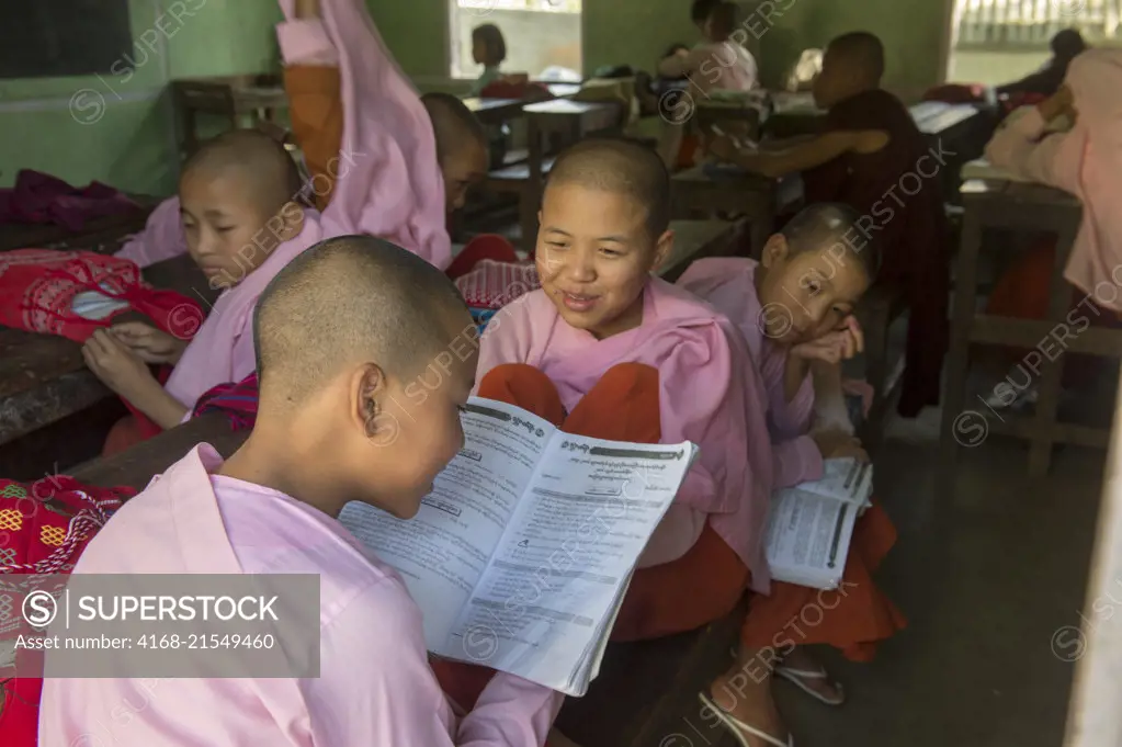 Students in a classroom at the public school of the Aungmyazoo Monastary in Sagaing, a town outside of Mandalay, Myanmar.