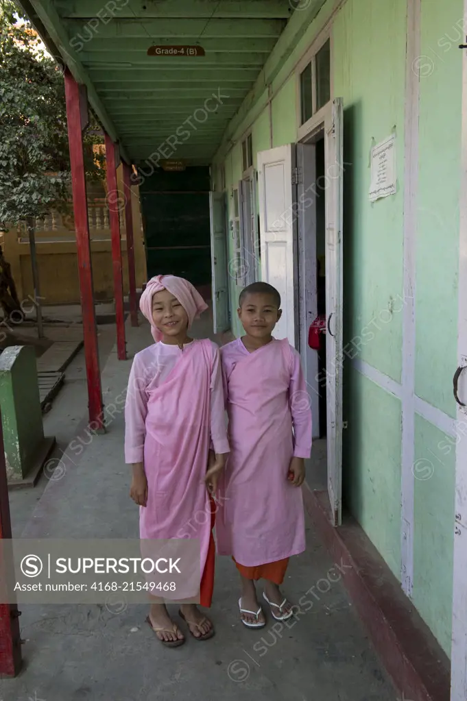 Girl novices at the public school of the Aungmyazoo Monastary in Sagaing, a town outside of Mandalay, Myanmar.
