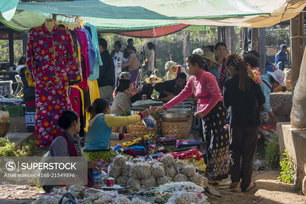 A colorful market scene in the village of Khaung Tai on Inle Lake in Myanmar.
