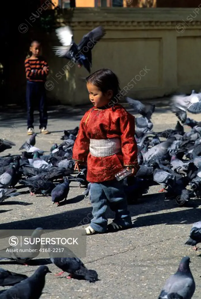 Mongolia, Ulan Bator, Gandan Monastery, Girl With Pigeons